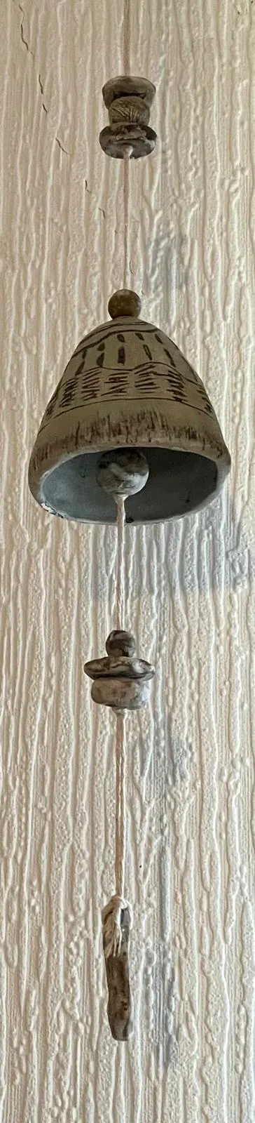 Wind Chime hanging outdoors, lifestyle